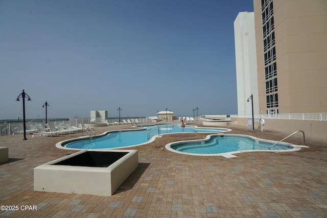 view of pool with a patio area