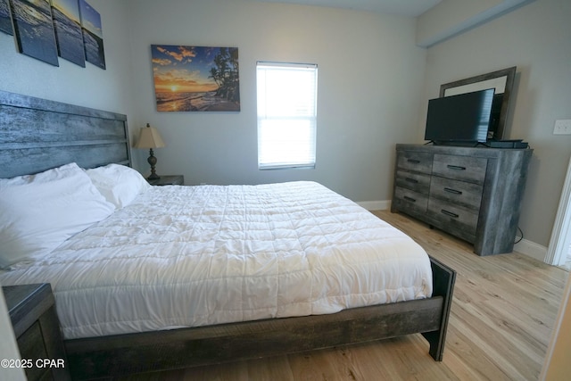 bedroom with light hardwood / wood-style flooring