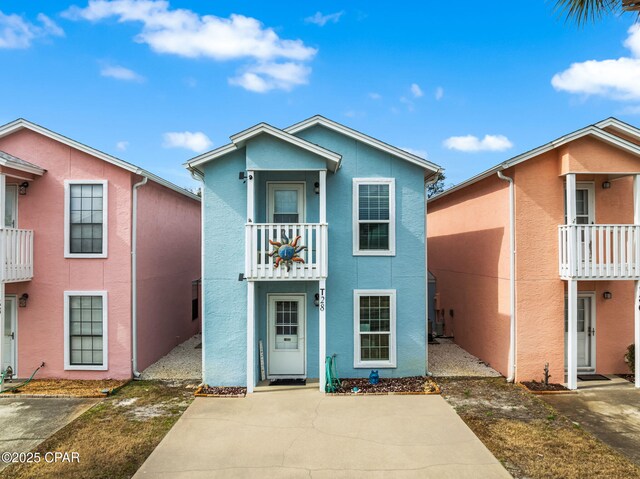 17214 Front Beach Rd Unit T28, Panama City Beach, FL 32413 - view of front facade with a balcony and stucco siding