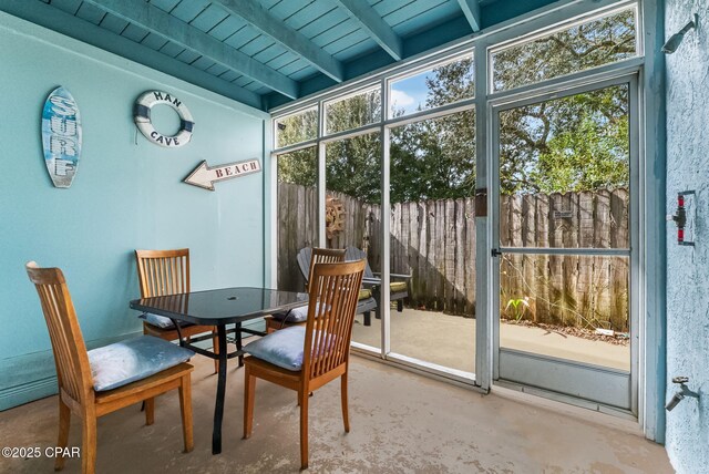17214 Front Beach Rd Unit T28, Panama City Beach, FL 32413 - sunroom / solarium featuring outdoor dining space and beam ceiling