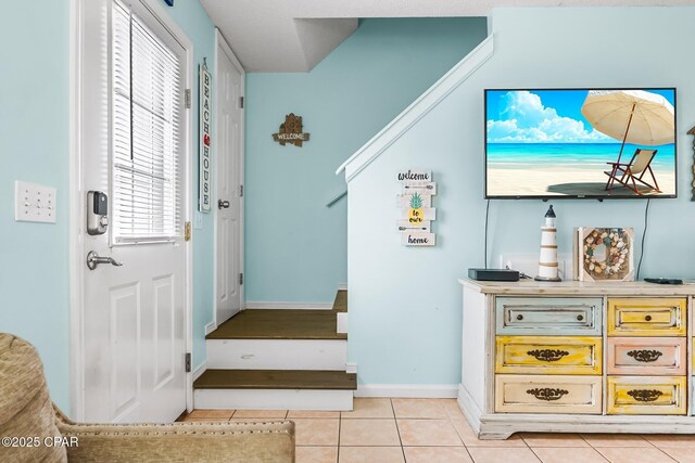 17214 Front Beach Rd Unit T28, Panama City Beach, FL 32413 - entryway with light tile patterned flooring and baseboards