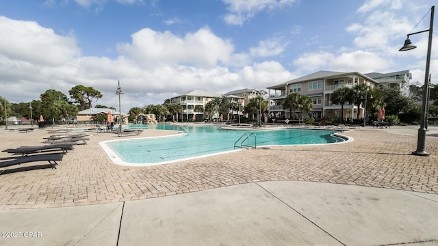 view of swimming pool featuring a patio