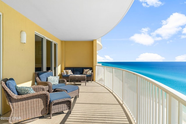 balcony featuring a water view