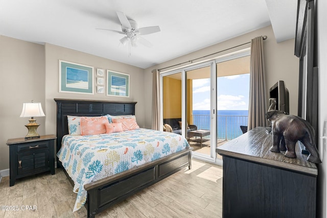 bedroom with access to outside, ceiling fan, and light hardwood / wood-style flooring