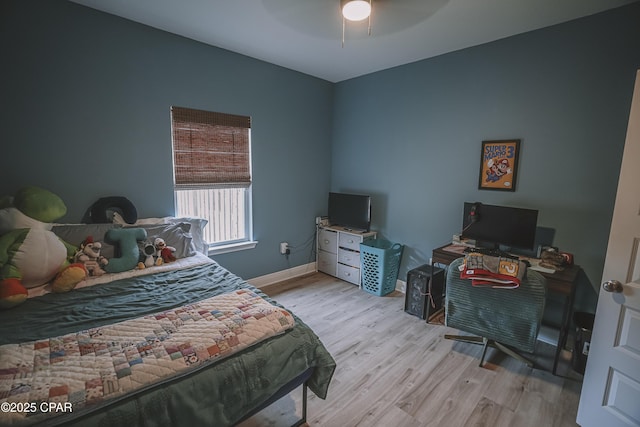 bedroom featuring ceiling fan and light wood-type flooring