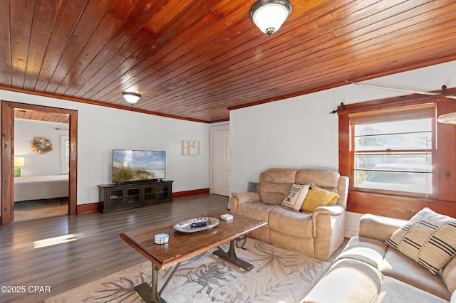 living area with ornamental molding, wooden ceiling, wood finished floors, and baseboards