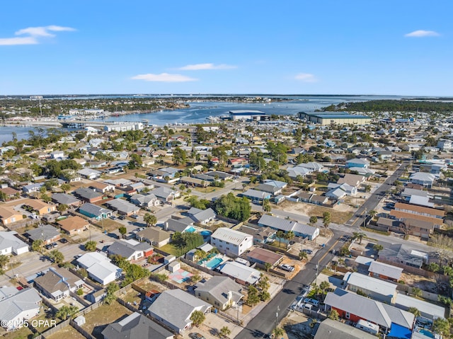 bird's eye view featuring a residential view and a water view