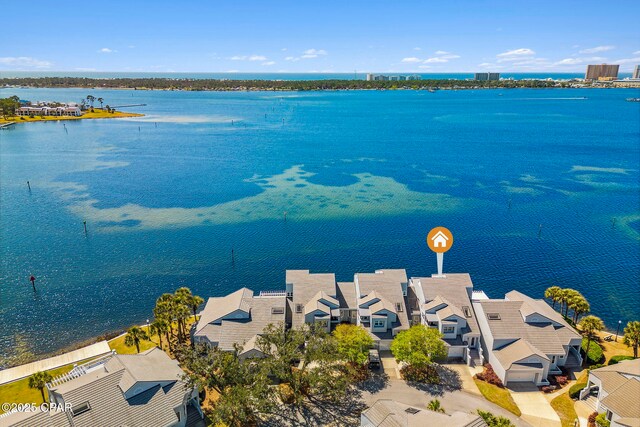 bird's eye view with a water view