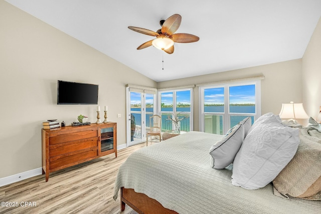 bedroom with lofted ceiling, access to outside, ceiling fan, and light hardwood / wood-style flooring