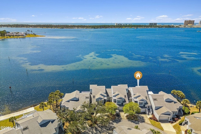 birds eye view of property featuring a water view