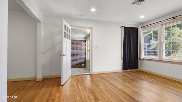 unfurnished bedroom with light hardwood / wood-style flooring