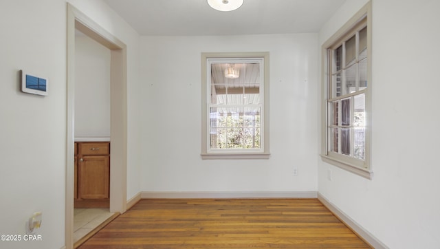 empty room featuring hardwood / wood-style flooring