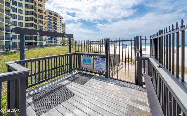 9850 S Thomas Dr Unit 806W, Panama City Beach, FL 32408 - wooden terrace with view of water and beach