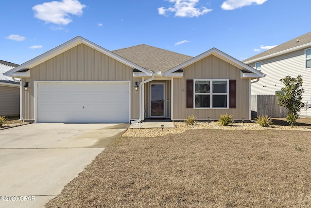 ranch-style home featuring a garage