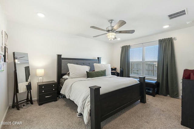 bedroom with light carpet and ceiling fan