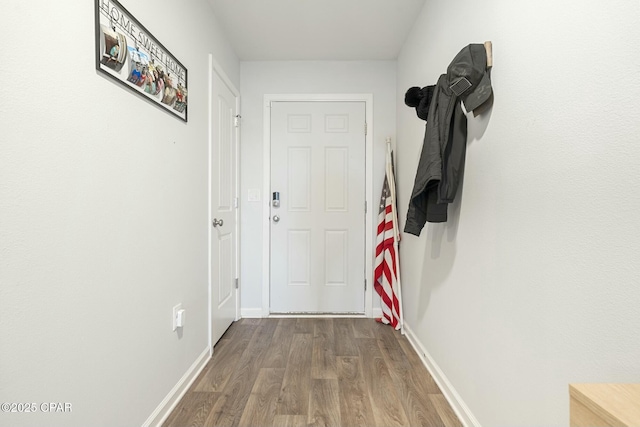 corridor featuring hardwood / wood-style flooring