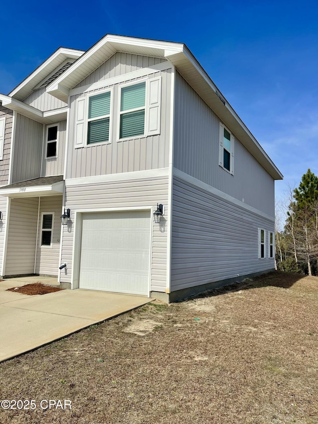 view of property exterior with a garage