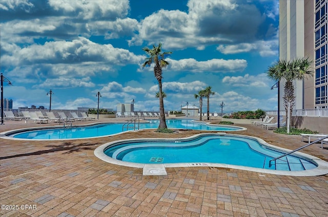 view of pool with a patio