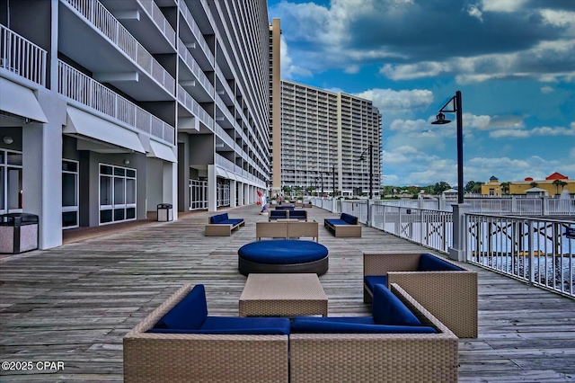 wooden deck with outdoor lounge area