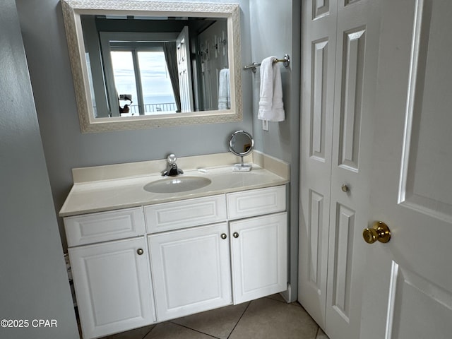 bathroom featuring vanity and tile patterned flooring