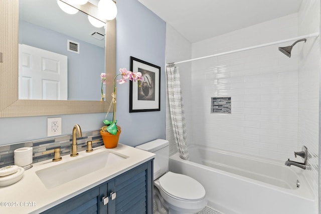 full bathroom featuring vanity, shower / bathtub combination with curtain, and toilet