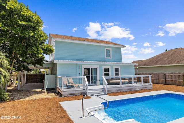 view of pool featuring a wooden deck