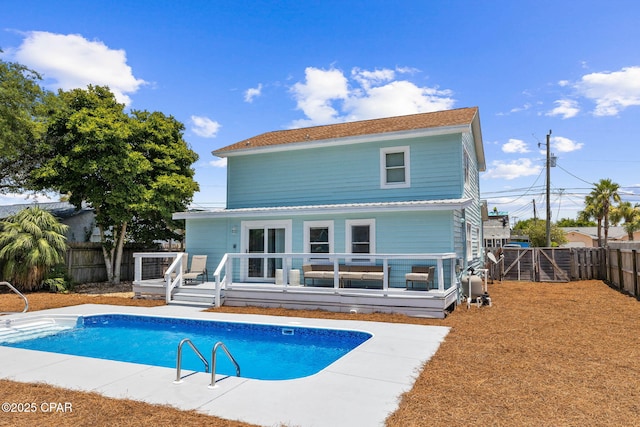 view of pool featuring a wooden deck