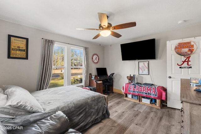 bedroom featuring light hardwood / wood-style flooring and ceiling fan