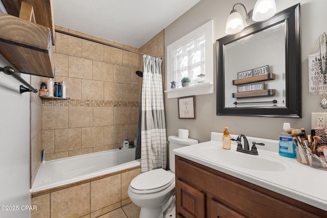 full bathroom with vanity, toilet, and shower / bath combo