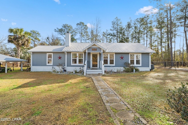 single story home featuring a front yard