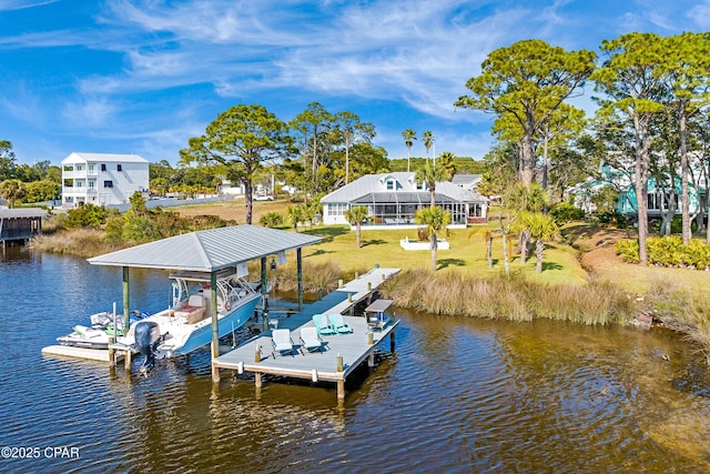 dock area featuring boat lift and a water view