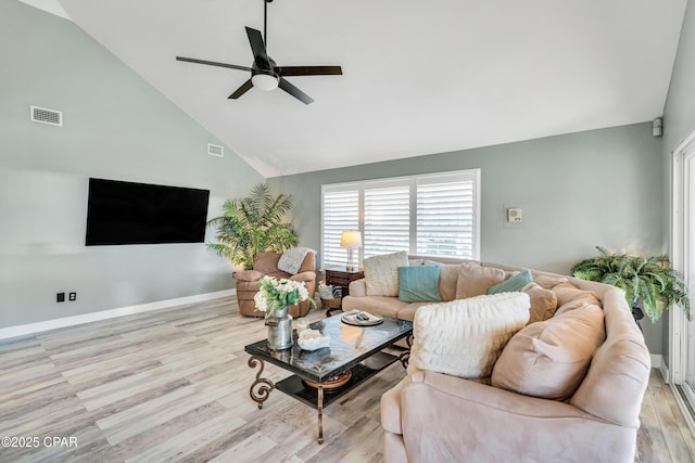 living room with ceiling fan, visible vents, high vaulted ceiling, and wood finished floors