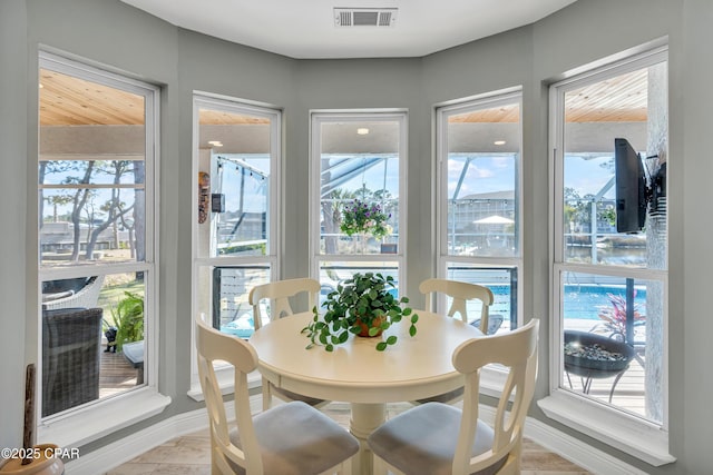 dining room featuring baseboards and visible vents