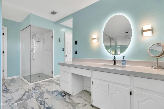 full bathroom featuring vanity, baseboards, visible vents, a shower stall, and marble finish floor