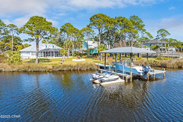 dock area featuring a yard and a water view