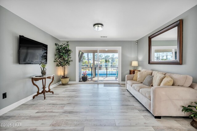 bedroom with light hardwood / wood-style floors and ceiling fan