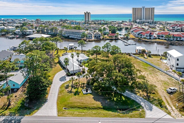 bird's eye view with a water view