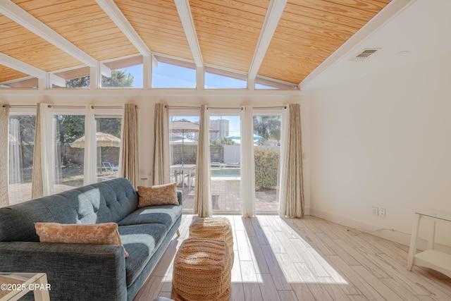 sunroom / solarium with wooden ceiling and vaulted ceiling with beams