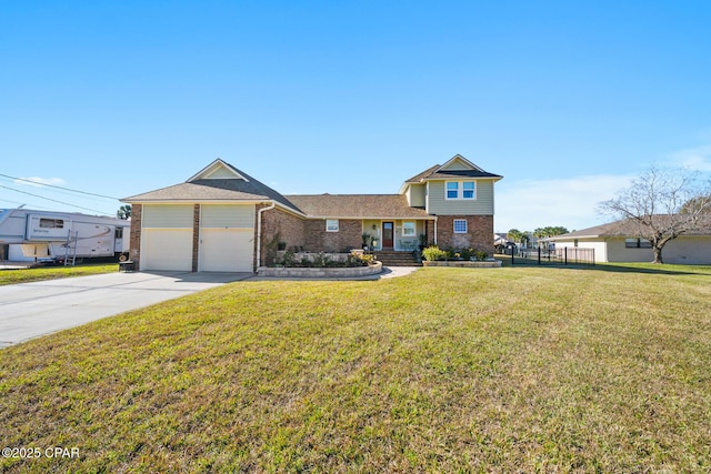 view of front of property with a front lawn and a garage