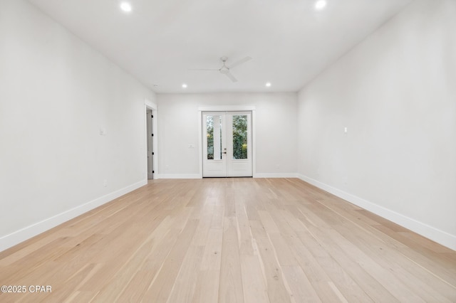 unfurnished room featuring ceiling fan, light wood-style flooring, recessed lighting, baseboards, and french doors