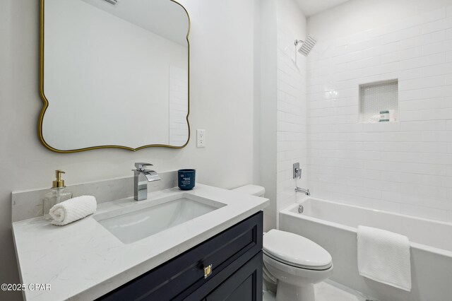 bathroom with toilet, shower / washtub combination, and vanity