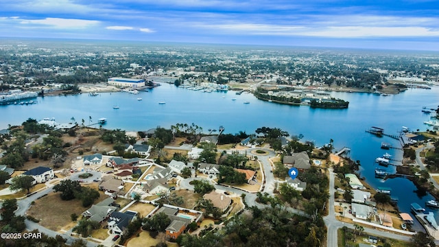 birds eye view of property featuring a water view and a residential view