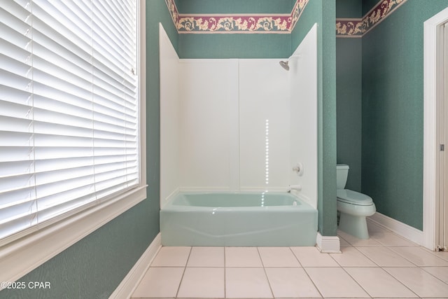 bathroom featuring tile patterned floors and toilet