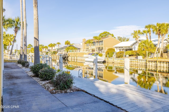 dock area with a water view