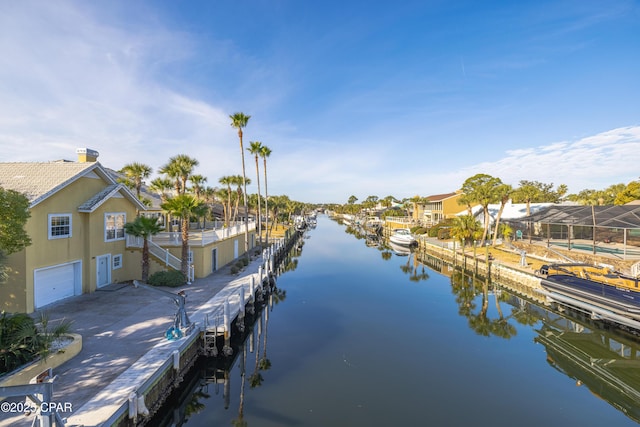 property view of water with a dock