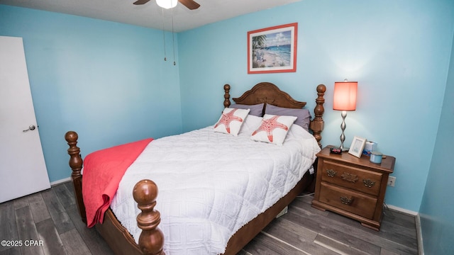 bedroom featuring dark hardwood / wood-style floors and ceiling fan