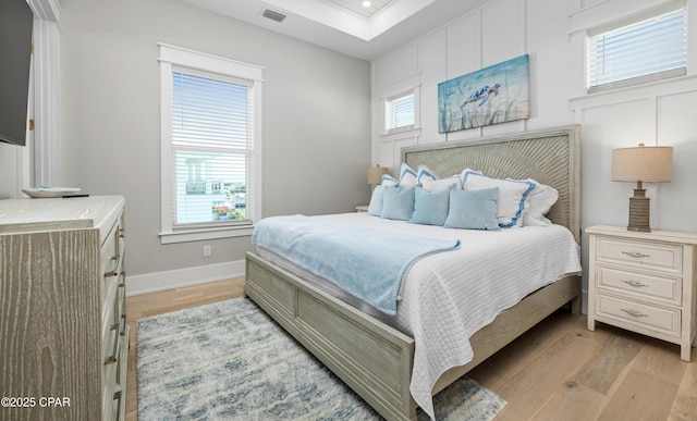 bedroom with light hardwood / wood-style floors