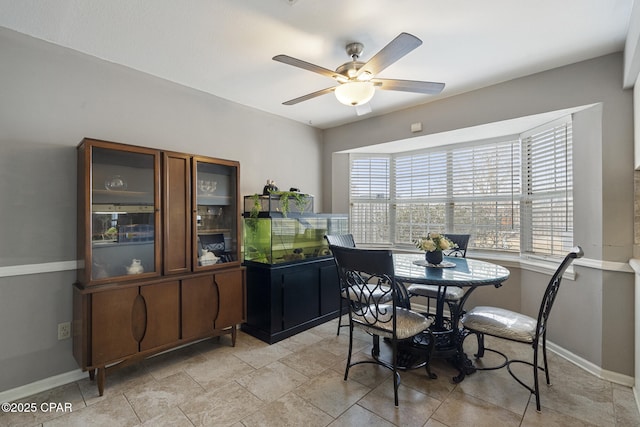 dining area with ceiling fan