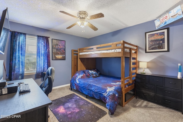 bedroom featuring ceiling fan, carpet flooring, and a textured ceiling