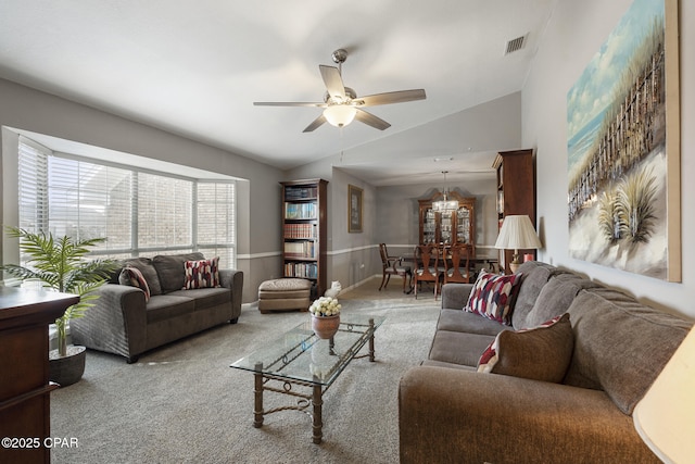 carpeted living room featuring lofted ceiling and ceiling fan